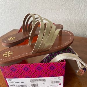 Tory Burch Patos Metallic Leather Thong Sandals In Spark Gold